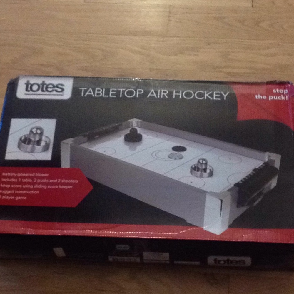 Totes tabletop air hockey game new!!!